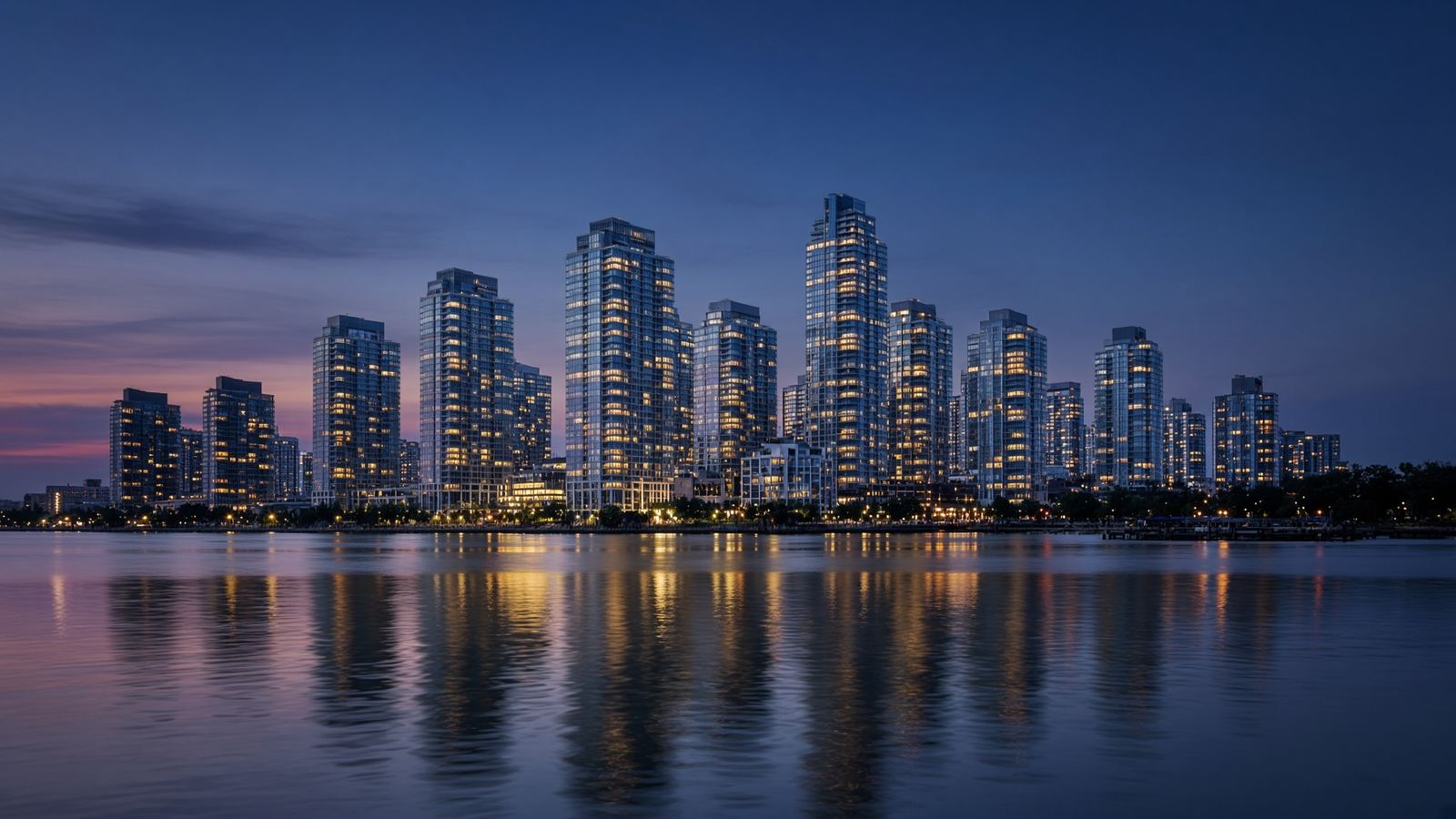 Mississauga waterfront condominiums at dusk along Lake Ontario